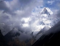 Mt Fishtail amid the mist of clouds s