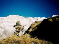Stone Pillar with Mt Annapurna on background